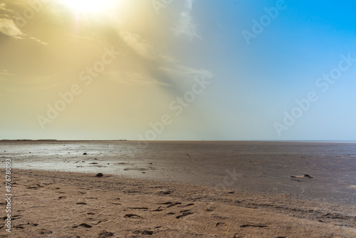 Zarzis Salt Lake. Image depicting the salt lake of Zarzis, between Djerba and Tataouine in Tunisia. The sand mixes with the salt, hence the white and ochre colour. photo