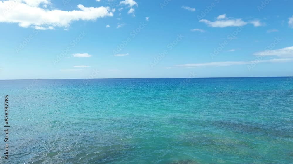 Hawaii Scenic Beach with Clear Blue Waters and Verdant Mountains Under a Bright Sky Hawaii Scenic Beach with Clear Blue Waters and Verdant Mountains Under a Bright Sky