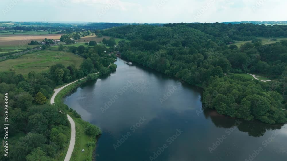 Panoramic View Of Trentham Lake With Green Shrubbery In England. Aerial Shot Panoramic View Of Trentham Lake With Green Shrubbery In England. Aerial Shot