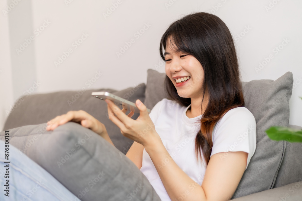 Woman meeting online on her laptop and smartphone at home Woman meeting online on her laptop and smartphone at home