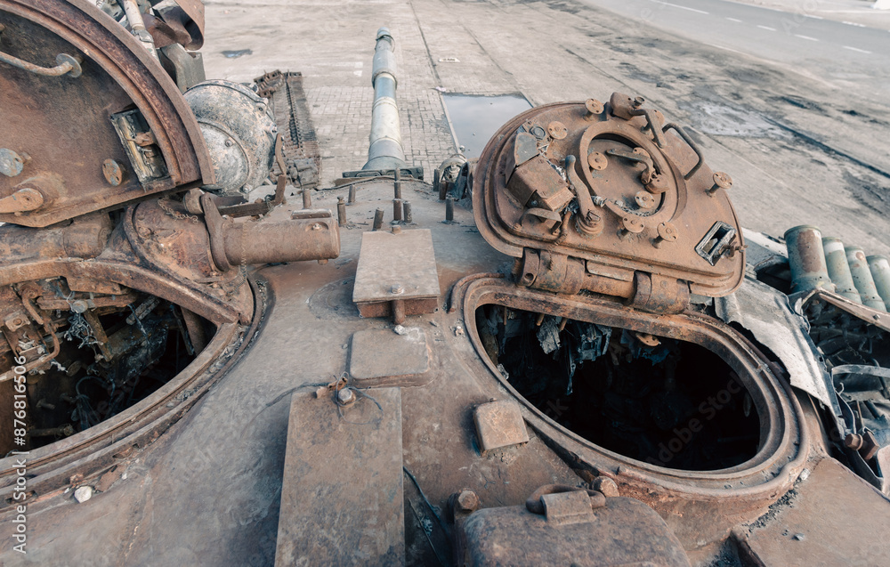 destroyed battle tank in a city lost during the war in Ukraine destroyed battle tank in a city lost during the war in Ukraine