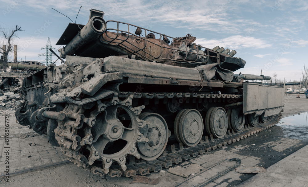 destroyed battle tank in a city lost during the war in Ukraine destroyed battle tank in a city lost during the war in Ukraine