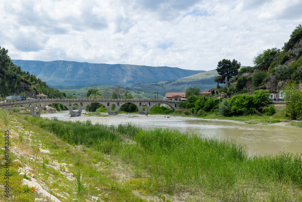 Scenic view of Gorica Bridge and the Ottoman houses along the Osum River in the central Albanian city of Berat Scenic view of Gorica Bridge and the Ottoman houses along the Osum River in the central Albanian city of Berat
