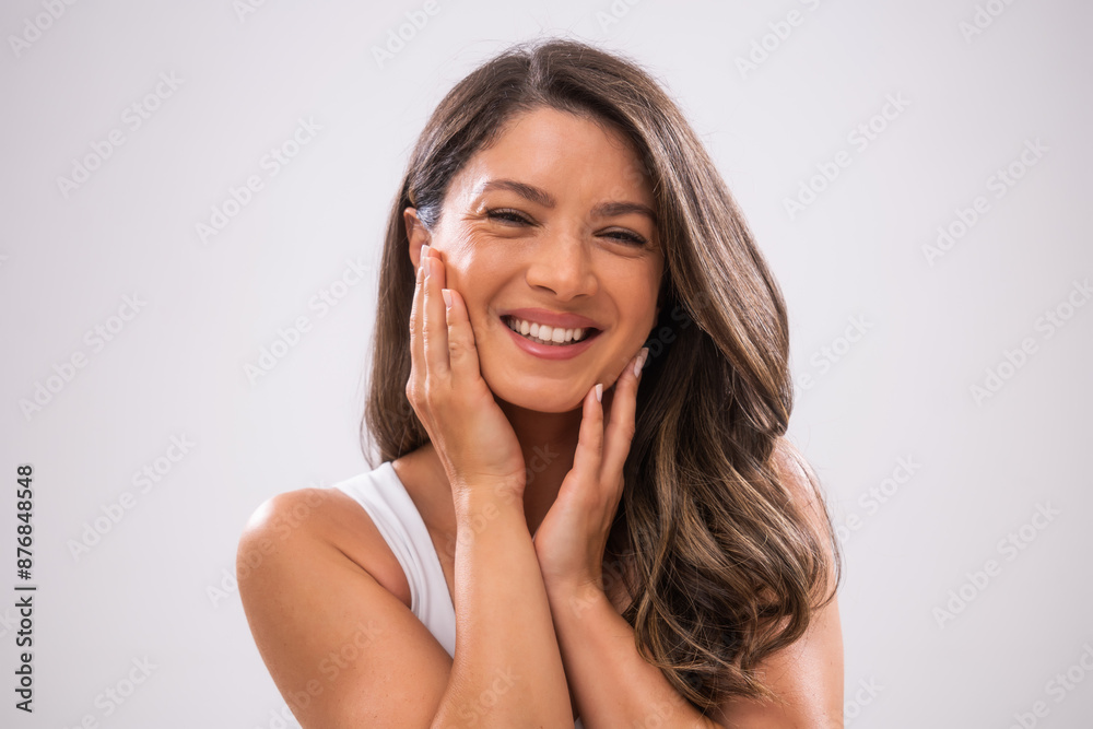 Portrait of adult woman who is satisfied with her skin. Portrait of adult woman who is satisfied with her skin.