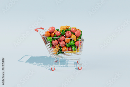 Shopping cart filled with artificial fruits and vegetables against blue background photo