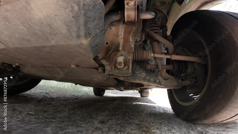 The operation of the car suspension in motion. Camera on the bottom of the car The operation of the car suspension in motion. Camera on the bottom of the car