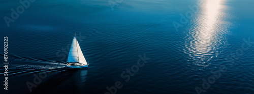 Sailing yacht in clear blue sea, aerial view, minimalist seascape, luxury vacation concept