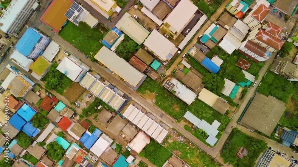 Top view of the dense development with narrow streets in Asian settlements. Aerial view Top view of the dense development with narrow streets in Asian settlements. Aerial view