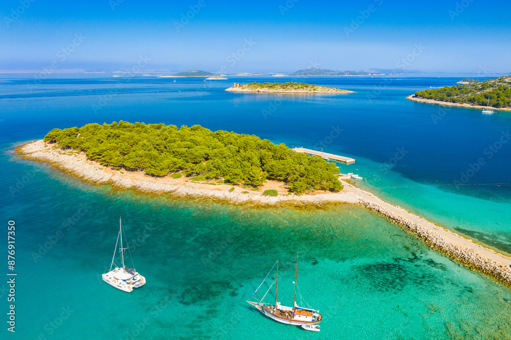 Turquoise sea, islands and yachts in Murter archipelago in Dalmatia, Croatia