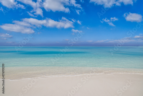 Closeup sandy beach, sunny blue sea sky. Panoramic beach landscape. Empty tropical beachfront and seascape copy space. White soft sand texture, calmness, tranquil relaxing sunlight, summer dream mood