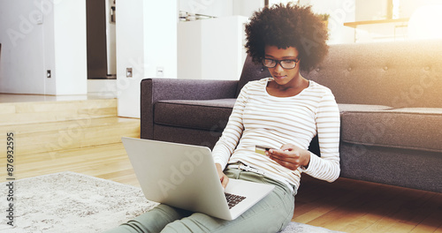 Black woman, relax and home with credit card or laptop for digital purchase, payment and online shopping for secure transaction. Girl, floor and subscription for membership service and virtual store.