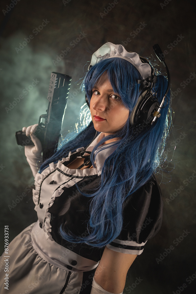 Fototapeta premium Girl with the rifle on the dark background.