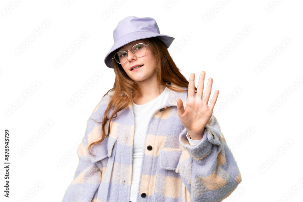 Teenager girl over isolated chroma key background saluting with hand with happy expression Teenager girl over isolated chroma key background saluting with hand with happy expression