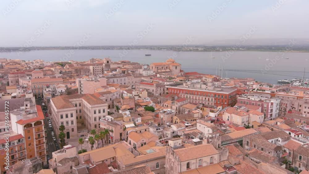 Syracuse, Italy: Aerial view of famous city on Sicily island, summer day with clear blue sky - landscape panorama of Europe from above
Syracuse, Italy: Aerial view of famous city on Sicily island, summer day with clear blue sky - landscape panorama of Europe from above