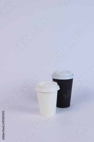 small and large glass with a lid on a white background. High quality photo