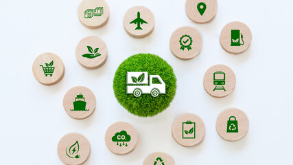 Green Logistics and supply chain concept. A miniature truck on green globe is surrounded by icons of eco-friendly practices, clean energy for transportation. Sustainable development and transport.