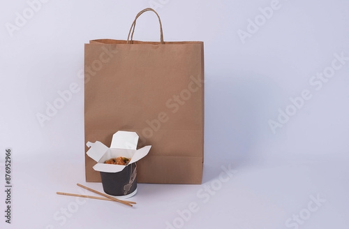 delivery of rice in a box, cardboard package on a white background. High quality photo