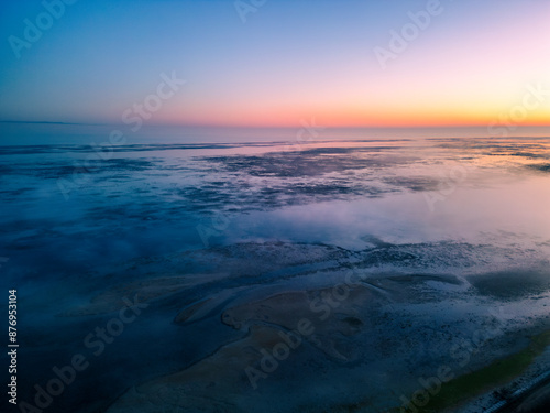 The golden island. Grado Island from above at sunset.