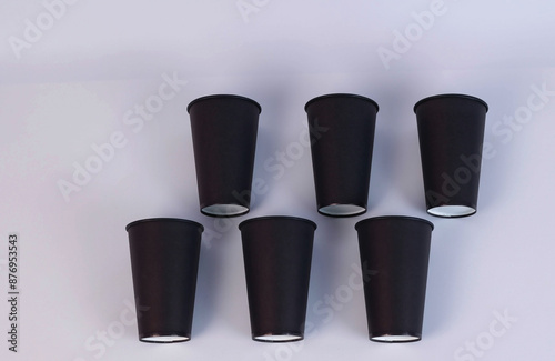 black glass with a lid in the center on a white background. High quality photo