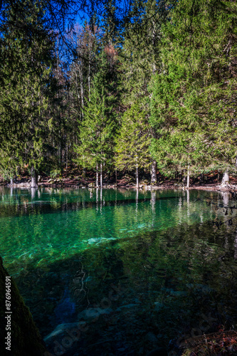 Morning in the Fusine lakes valley. Autumn reflections.