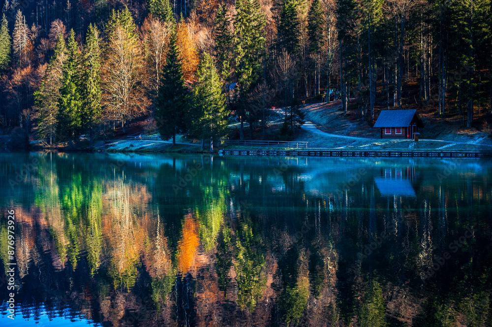 Fototapeta premium Morning in the Fusine lakes valley. Autumn reflections.