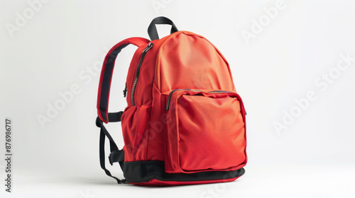 An empty backpack is sitting on a white background, ready to be filled with school supplies.