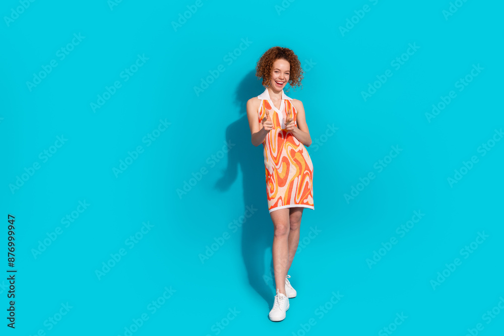 Full body photo of attractive young woman point you hello dressed stylish orange clothes isolated on cyan color background Full body photo of attractive young woman point you hello dressed stylish orange clothes isolated on cyan color background