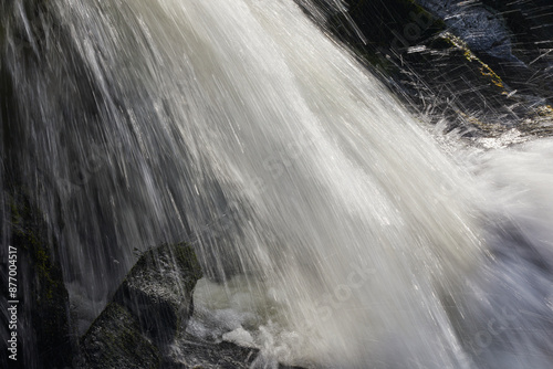 Waterfall shot with a slow shutter speed, resulting in blurred motion, at Welcombe Mouth, Hartland, north Devon, England, United Kingdom, Europe
