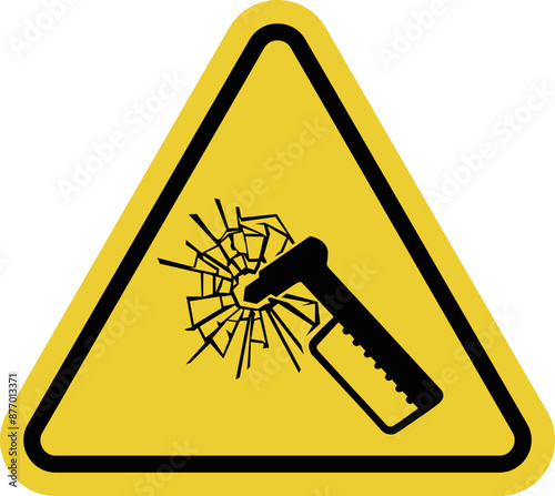 Emergency hammer sign. Location of hammer for breaking glass in an emergency such an accident or fire. Used in buses, trains and buildings to provide rapid evacuation. Warning yellow triangular sign.