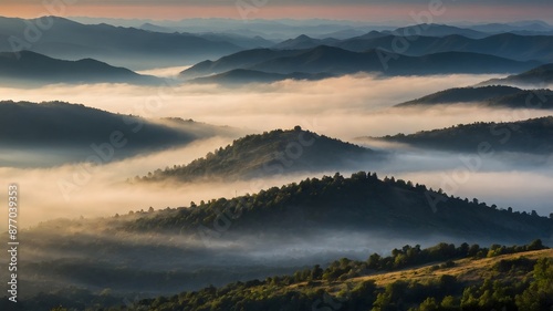 a misty mountain in the early morning with the first