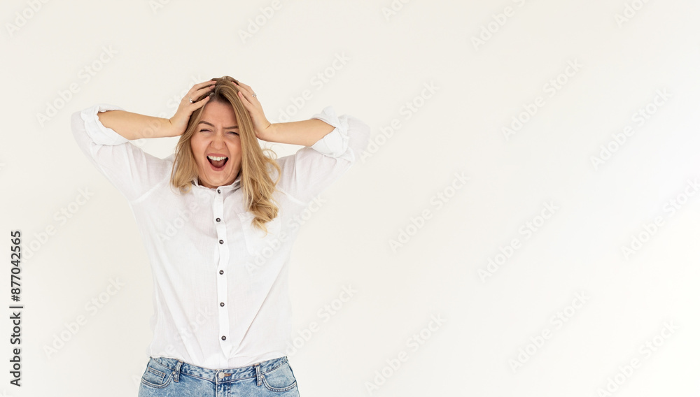 Photo of shocked afraid cute girl open mouth hands head wear white shirt isolated white background Photo of shocked afraid cute girl open mouth hands head wear white shirt isolated white background