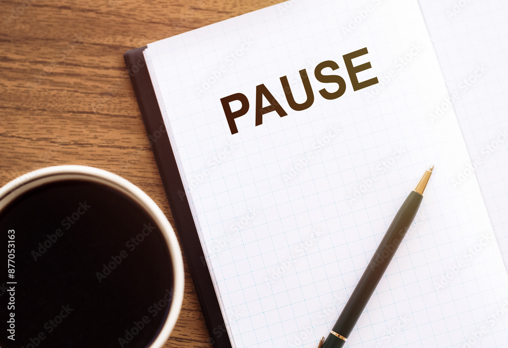 Word Pause on Paper Next to Coffee Cup Word Pause on Paper Next to Coffee Cup