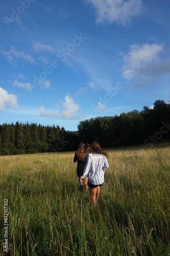friends in field, summertime