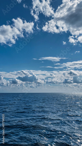 a beautiful blue sea background, blue sea, sea background, sea with white cloud, nature background, water of sea