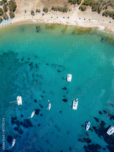 Fototapeta Naklejka Na Ścianę i Meble -  Aerial top down view of the bay and beach of Otzias, Kea Tzia Island, Greece, popular anchorage point for sailors