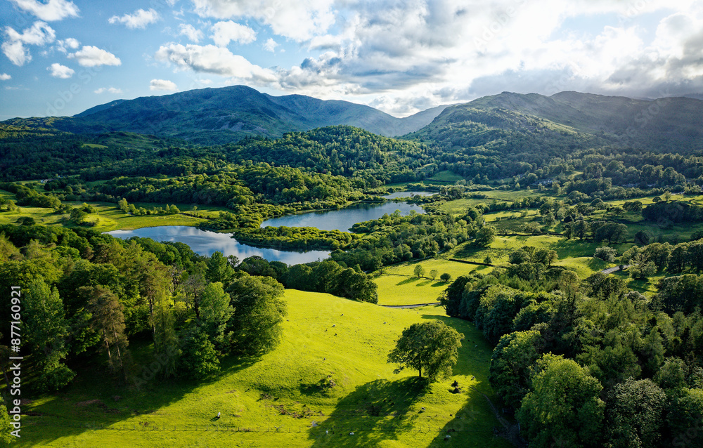 Lake District National Park landscape. S.W. over Elterwater from above Neaum Crag, Langdale, to Wetherlam mountain and Wrynose Pass. Summer evening