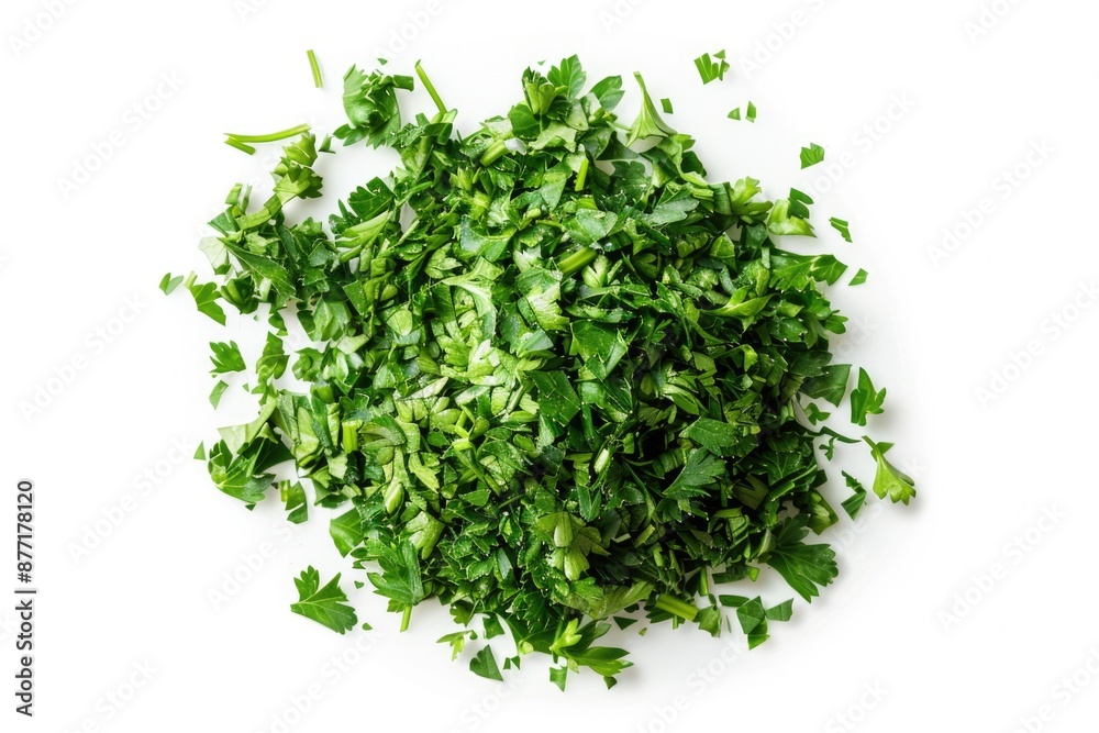 A pile of fresh parsley leaves on a clean white surface, ready for use in cooking or garnishing A pile of fresh parsley leaves on a clean white surface, ready for use in cooking or garnishing