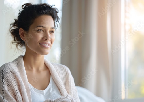 Young Woman in Cozy Sweater Relaxing by Sunlit Window on a Calm Morning Free Download Young Woman in Cozy Sweater Relaxing by Sunlit Window on a Calm Morning - GFXLoad