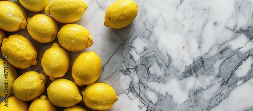 Lemons arranged on a marble...
