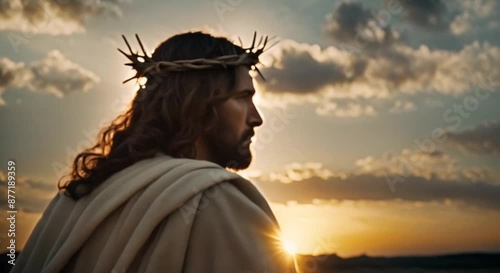 jesus with a crown of thorns on his head looking at sunrise