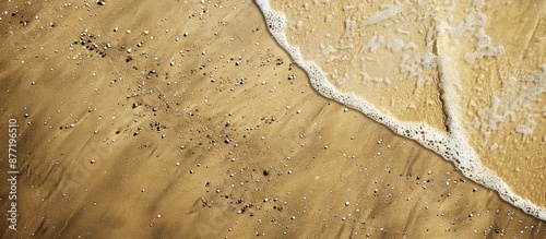 Textures of a sandy beach w...