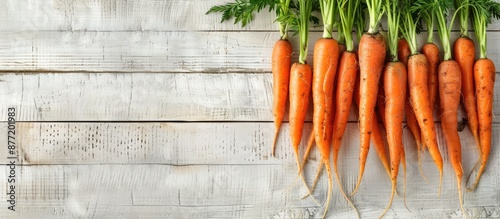 Fresh carrots arranged on a...