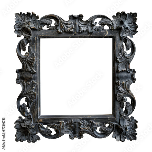 Elegant ornate dark wood picture frame with intricate floral pattern, suitable for classic and vintage home decor styles. photo
