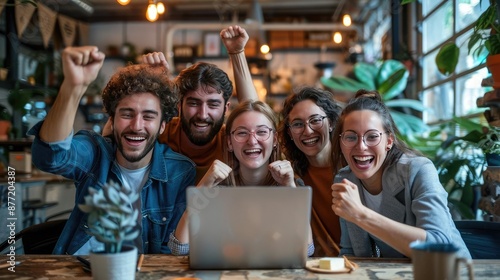 Remote team celebrating a project milestone via video conference, emphasizing remote team spirit