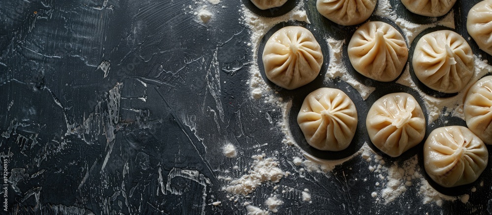 Georgian khinkali dumplings showcased on a dark concrete surface with ample copy space image Georgian khinkali dumplings showcased on a dark concrete surface with ample copy space image