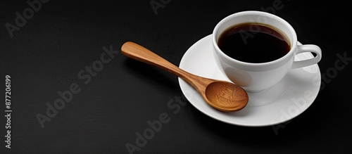 A white coffee cup and sauc...