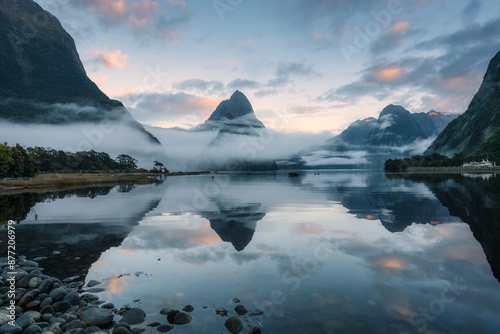 Milford Sound with Mitre peak and foggy on the lake at Fjordland national park, New Zealand photo