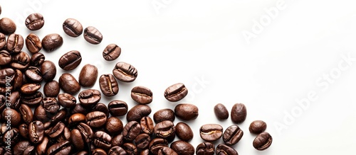 Coffee beans on a white bac...