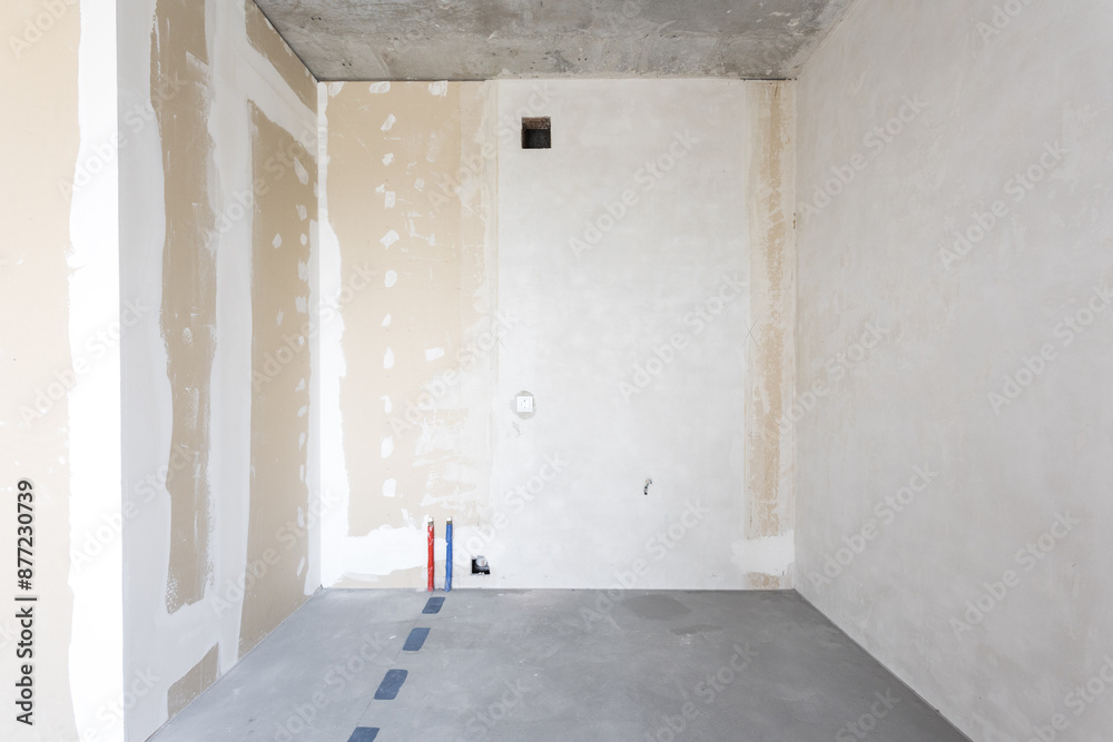 interior of the apartment without decoration in gray colors. rough finish interior of the apartment without decoration in gray colors. rough finish