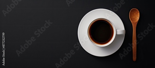 A white coffee cup and sauc...